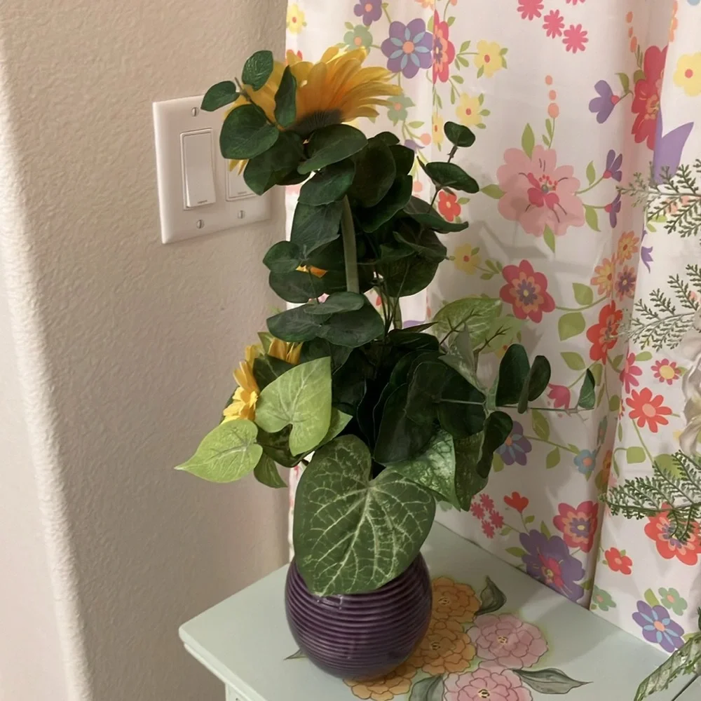 Michaels Gorgeous Yellow Flowers in Purple Ceramic Vase
